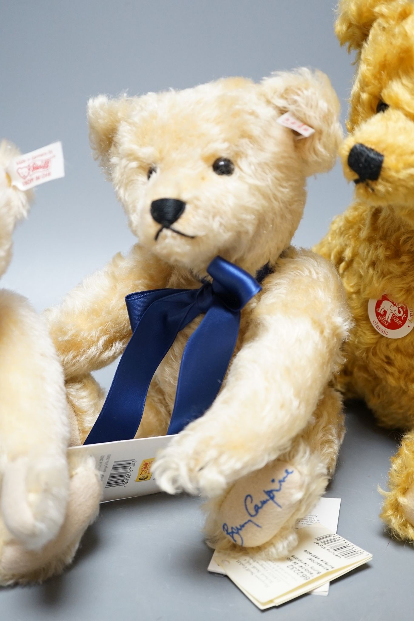 A Side-To-Side Steiff bear, white label, 35cm, box / certificate, together with an Anniversary Bear Box 25cm. a Steiff Bunny Campione bear with box and certificate, 28cm